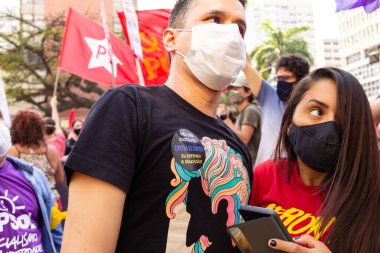 Fotoğraf, Brezilya Cumhurbaşkanı Jair Bolsonaro 'ya karşı düzenlenen bir protesto sırasında çekildi..