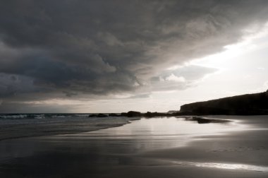 Las Catedrales beach, ribadeo, Spain. A storm in arriving clipart