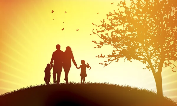 Familjen vid solnedgången — Stock vektor