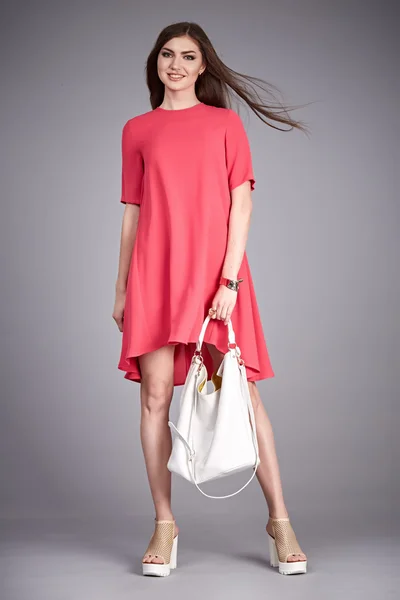 Catalog of fashion clothes for business woman mom casual office style meeting walk party silk cotton dress summer collection accessory shoes beautiful model long brunette hair natural make up  bag — Zdjęcie stockowe