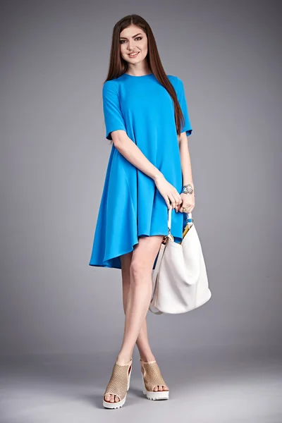 Catalog of fashion clothes for business woman mom casual office style meeting walk party silk cotton dress summer collection accessory shoes beautiful model long brunette hair natural make up  bag — ストック写真