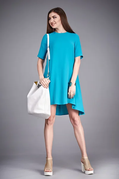 Catalog of fashion clothes for business woman mom casual office style meeting walk party silk cotton dress summer collection accessory shoes beautiful model long brunette hair natural make up  bag — Zdjęcie stockowe