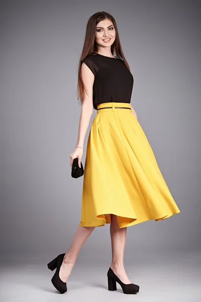 Beautiful sexy glamor woman lady long brunet hair makeup wear fashion clothes silk or cotton blouse trendy skirt lather shoes catalog in studio casual office clothes businesswoman accessory body bag — Stock Photo, Image