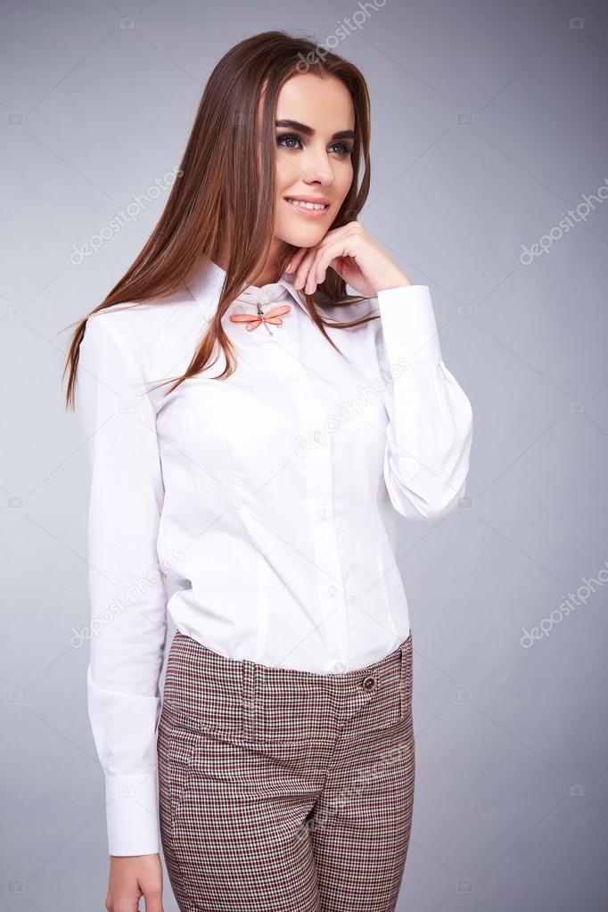Beautiful Sexy Young Business Woman Brunette Hair With Evening Make Up Wearing Casual Suit Office Style High Heeled Shoes Business Clothes For Meetings And Beautiful Sexy Young Business Woman Brunette Hair With Evening Make Up Wearing Casual Suit Office Style High Heeled Shoes Business Clothes For Meetings And