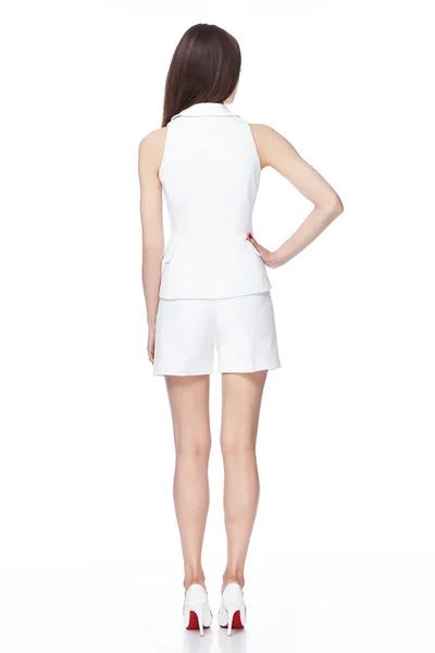 Unga sexiga vackra kvinnliga modellen i vit kort kostym — Stockfoto