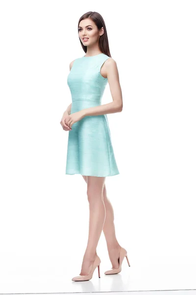 Beautiful fashion model wear silk light-blue short dress — Stock Photo, Image
