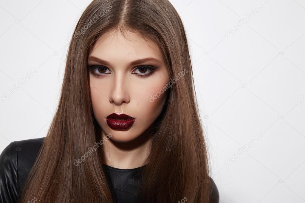 Beautiful sexy woman color makeup bordo lips dark eyes cosmetics