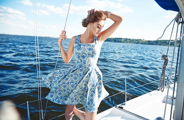 Beautiful sexy brunette girl in dress makeup summer trip yacht — Stock Photo, Image