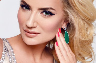 Beautiful sexy blond woman dress luxary party jewelry makeup