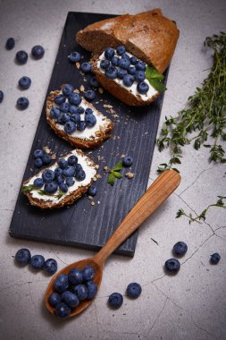 Tasty healthy food bread cream cheese blueberry juicy organic