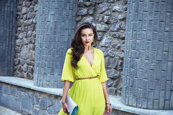 Beautiful sexy brunette woman walk silk dress party street — Stock Photo, Image