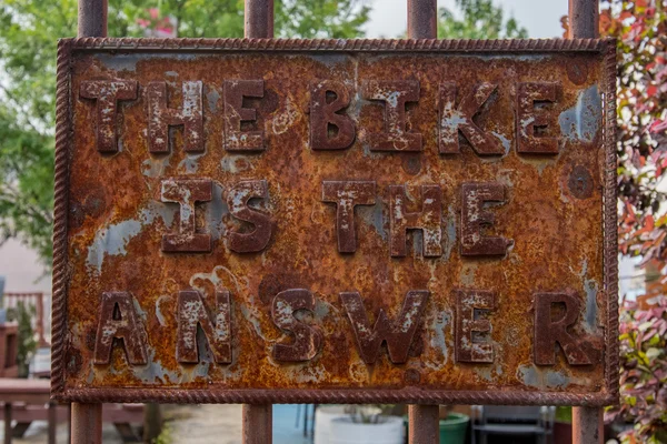 The Bike is the Answer Rusted Sign — Stock Photo, Image