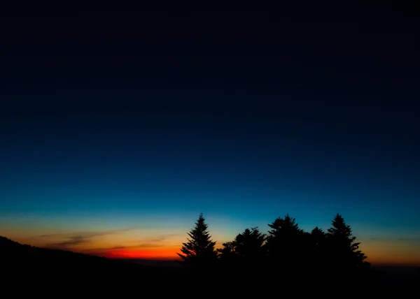 Karanlık gökyüzü turuncu günbatımı için degrade — Stok fotoğraf