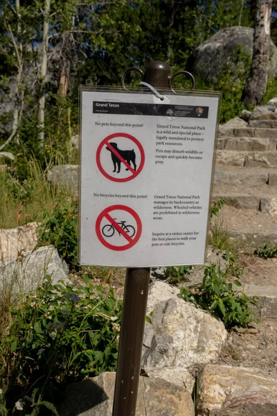 Grand Teton No Dogs or Bikes Sign at trailhead