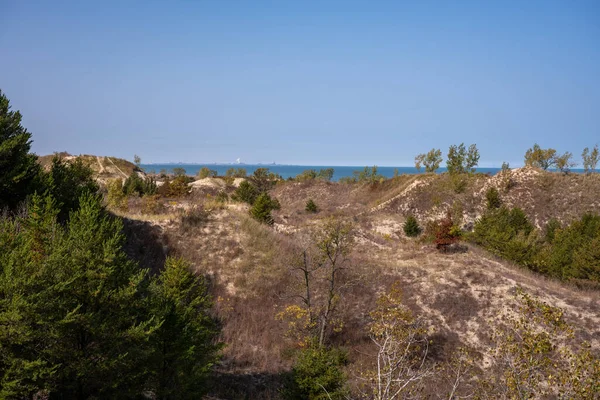 Indiana Dunes National Park with Industrial Park Across The Waters of Lake Michigan