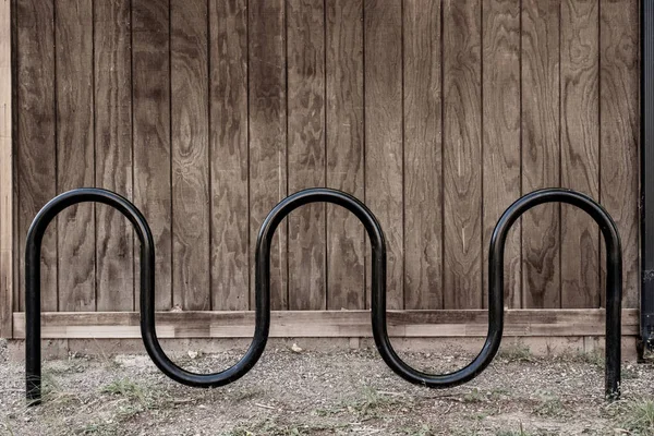 Curved Bike Rack Front Wooden Wall — 스톡 사진