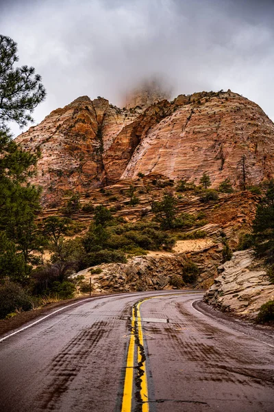 Rock Face Swallowed Fog Moving Road Sion National Park — Stock fotografie