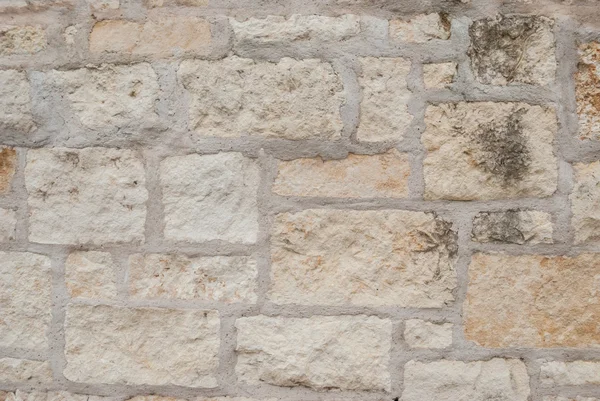 Muro de piedra beige Fondo —  Fotos de Stock