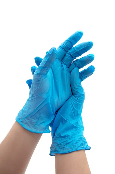 Médico poniéndose guantes protectores, aislado en blanco — Foto de Stock