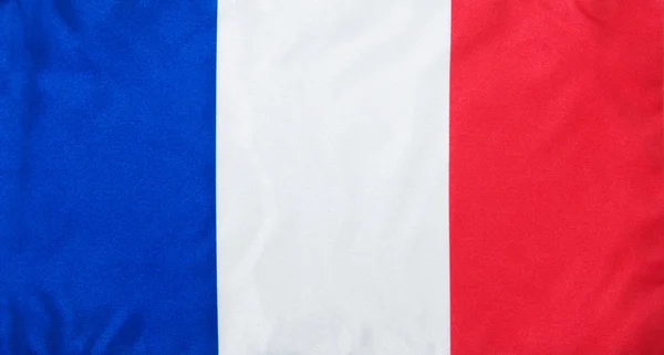 Bandera de Francia sobre textura satinada — Foto de Stock