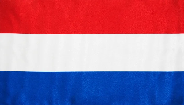 Tyg konsistens av Nederländernas flagga — Stockfoto