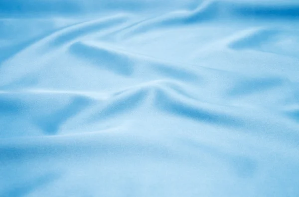 Blå satin som bakgrund — Stockfoto
