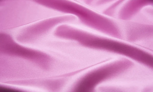 光滑典雅的粉红缎子可用作背景 — 图库照片