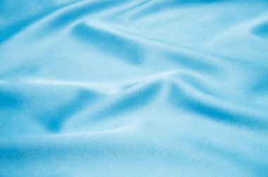 Pürüzsüz mavi saten arka plan olarak kullanılabilir