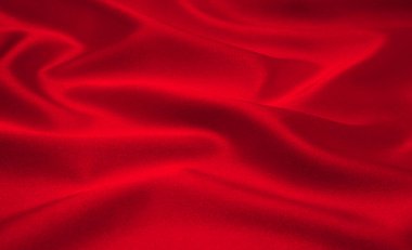 Arkaplan olarak kırmızı saten veya ipek kumaş