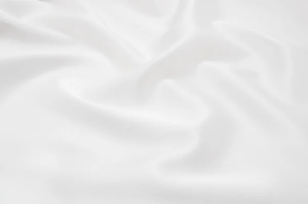 Arkaplan olarak beyaz saten kumaş — Stok fotoğraf