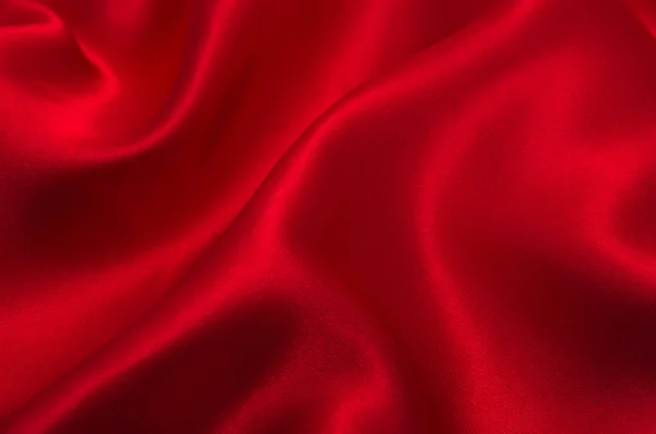Satin rouge ou tissu de soie comme fond — Photo