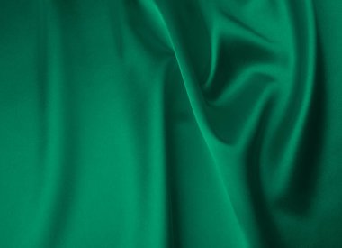 Arkaplan olarak yeşil saten kumaş