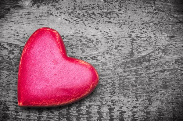 Red heart on a wooden background — Stock Photo, Image