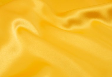 pürüzsüz altın rengi ipek arka plan olarak kullanılabilir