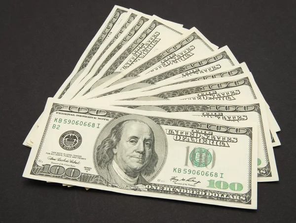 Банкноти доларів ізольовані на чорному тлі . — стокове фото