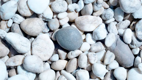 white pebbles on the beach, white stone for background