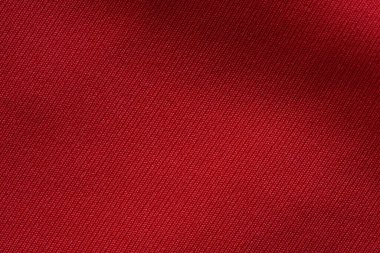 Kırmızı örülmüş kumaş dokusu arkaplanı