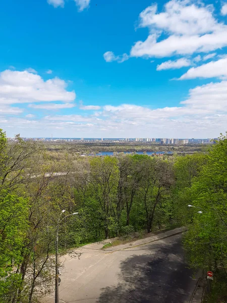 View of the city from above. City landscape. Green park and nature. Panorama.