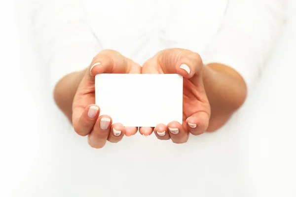 Woman's hands holding a card. — Stock Photo, Image