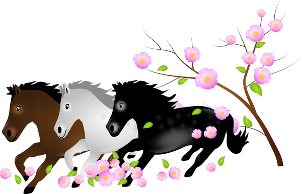 Tři koně běží v padající květy stromu — Stock fotografie