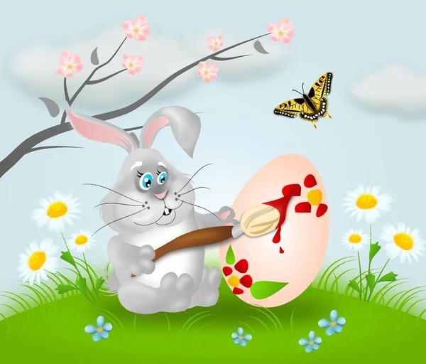 Easter rabbit painting egg — Stock Photo, Image