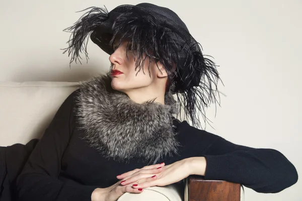 Portrait of a woman with black hat and fur — Stock Photo, Image