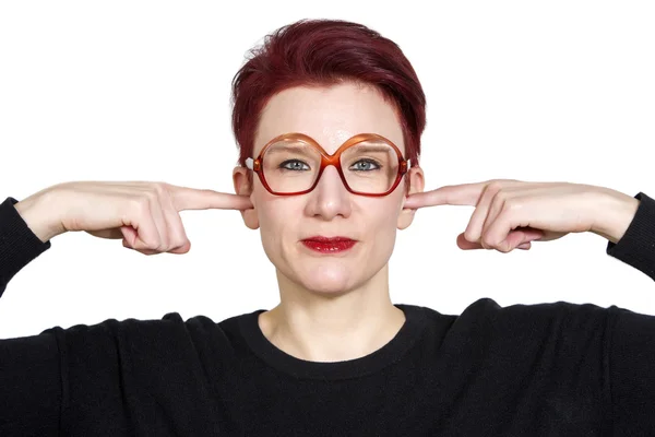 Portrait of woman with fingers to her ears — Stock Photo, Image