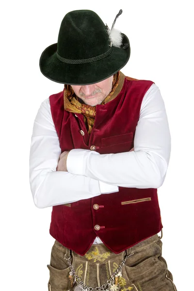 Porträtt av bayerska man i traditionell kläder tittar ner — Stockfoto