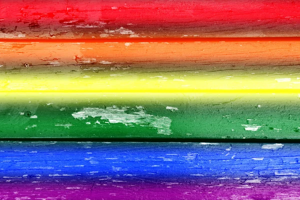 Fond en bois avec des couleurs arc-en-ciel pour gay pride — Photo