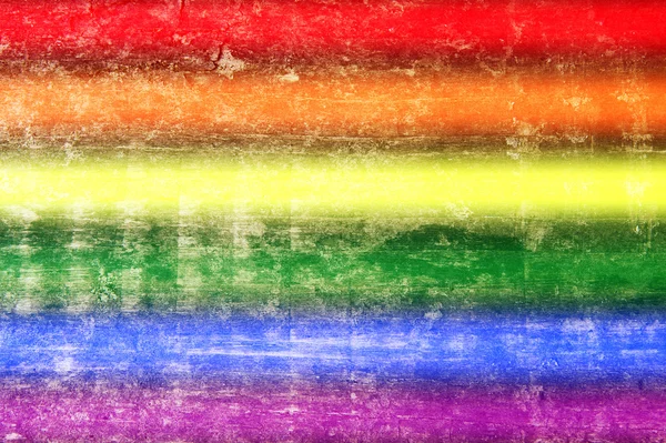 Sfondo in legno con colori arcobaleno per orgoglio gay — Foto Stock