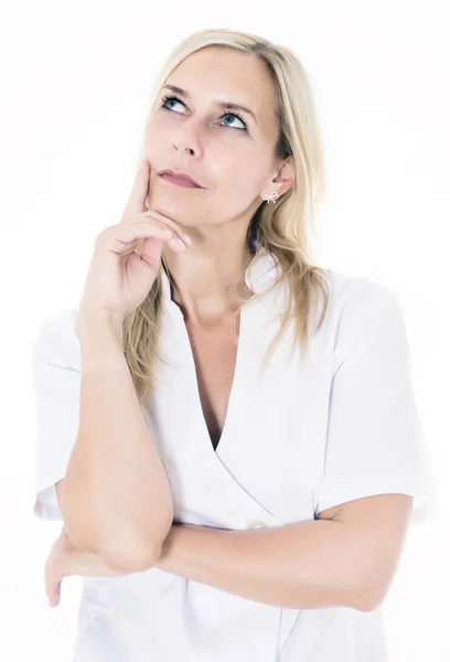 Portrait of a blond woman looking thoughtful — Stock Photo, Image