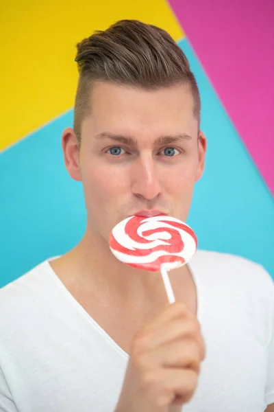 Portrait Handsome Blond Man Big Lollipop Colorful Background — Stock Photo, Image