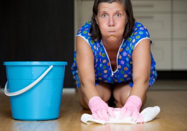 woman scrubbing the floor clipart