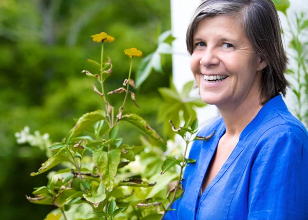 Portrait of woman on her balcony — Stock Photo, Image